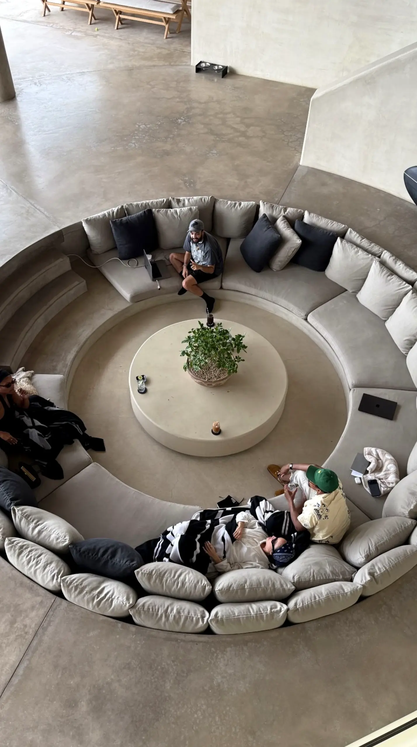 Soft decorative mirror brings comfort to the sitting area, creating a mood that feels fresh and intentional.