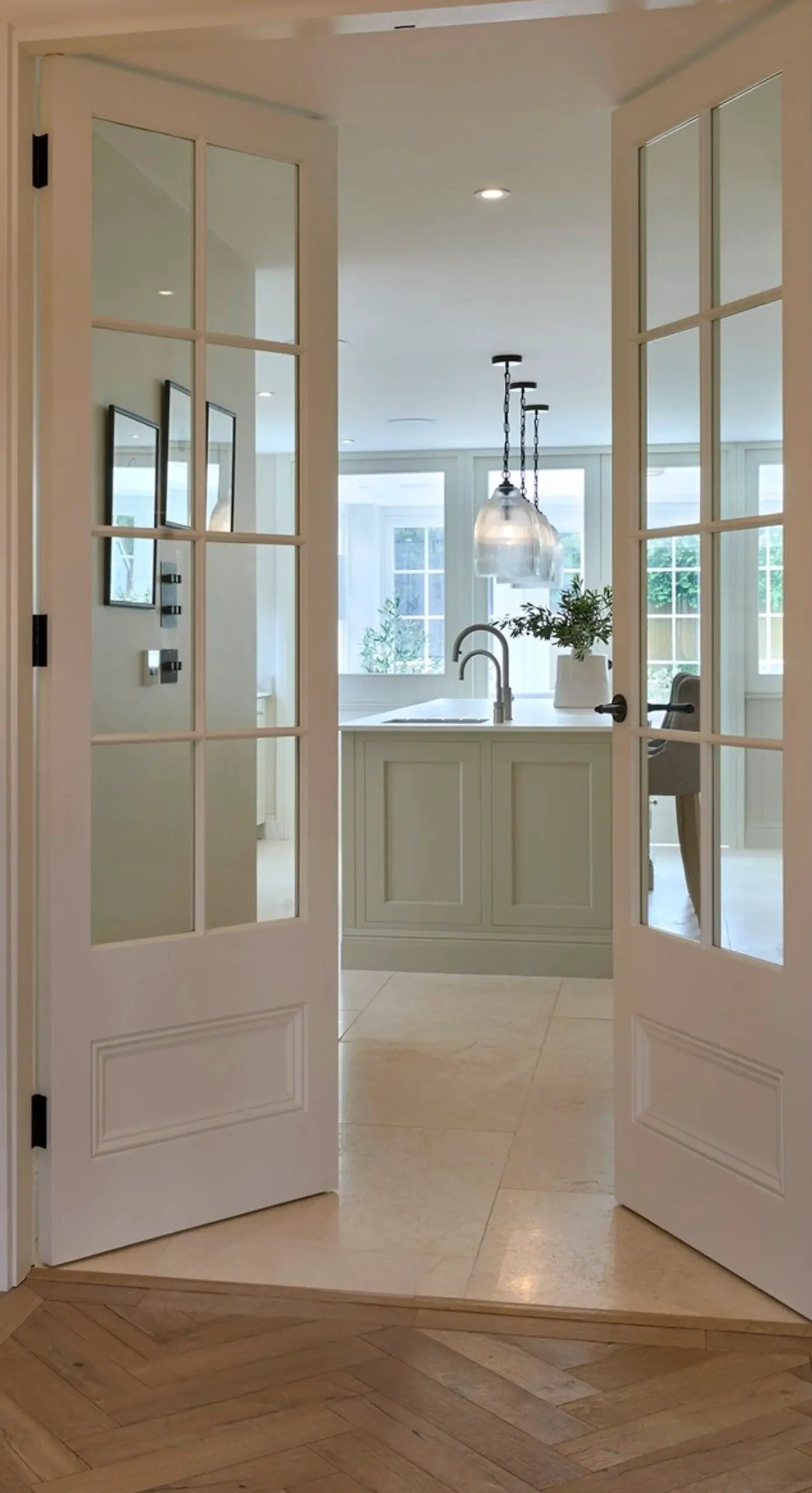 Compact decorative mirror introduces freshness into the view, keeping the atmosphere visually grounded.