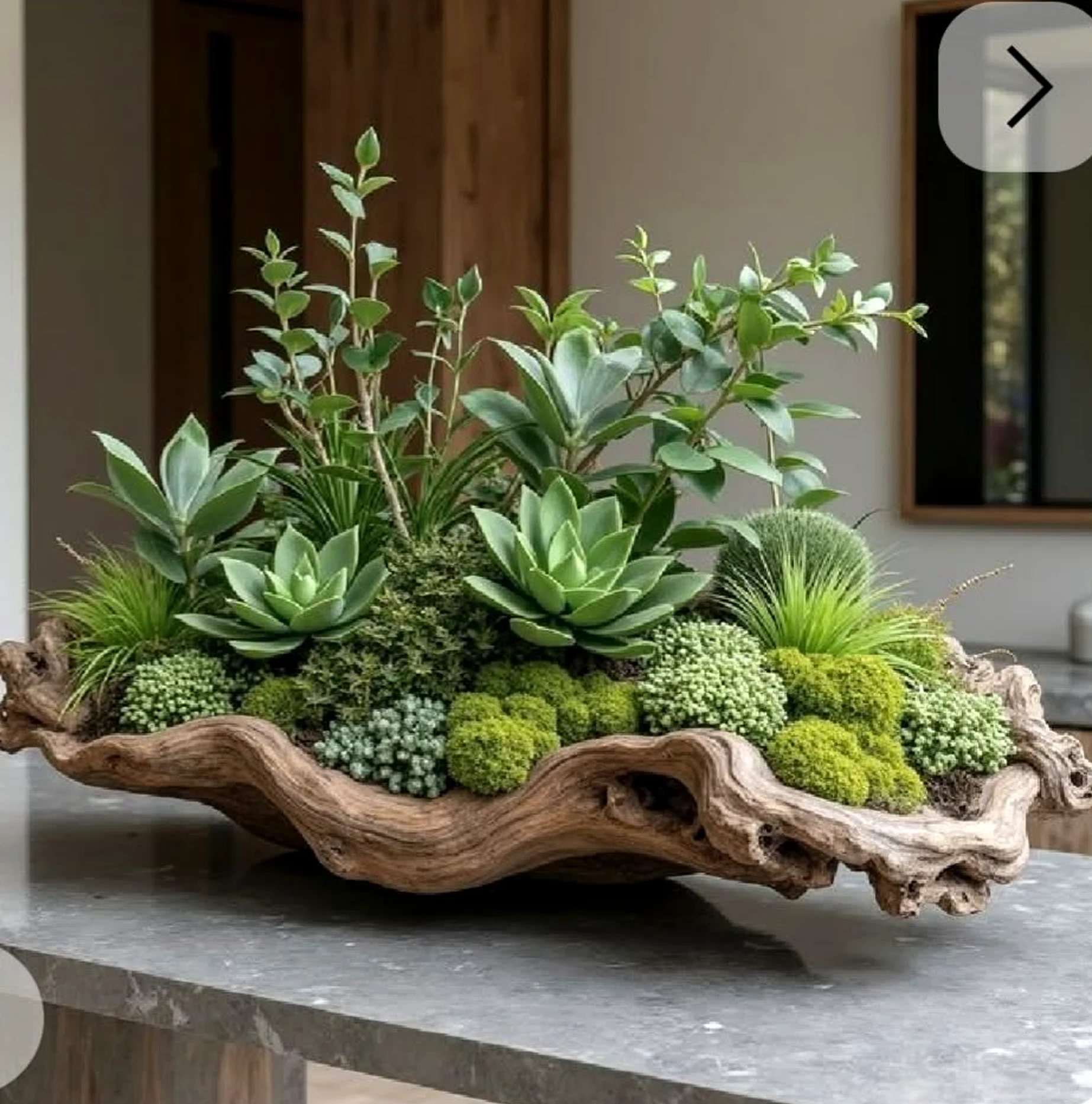 Warm terrace table anchors the outdoor space with depth, giving the view a mood that feels settled and welcoming.