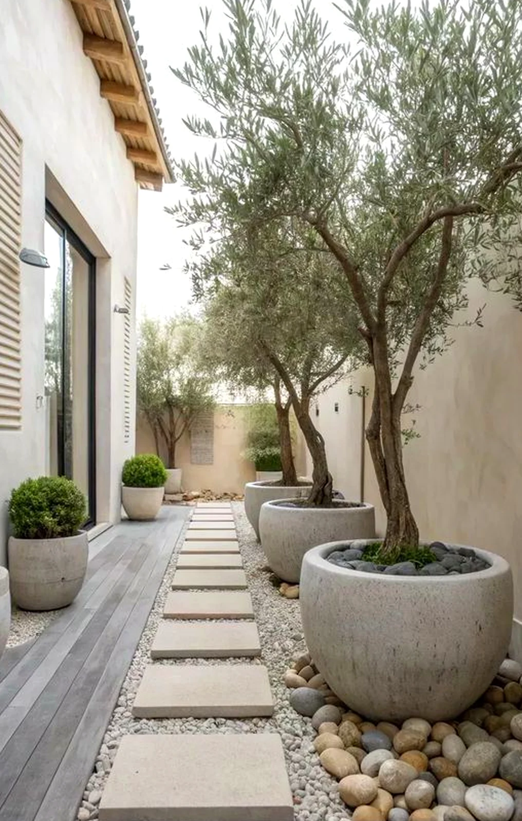 Refined stone terrace frames the arrangement with comfort, making the scene feel easy to enjoy.