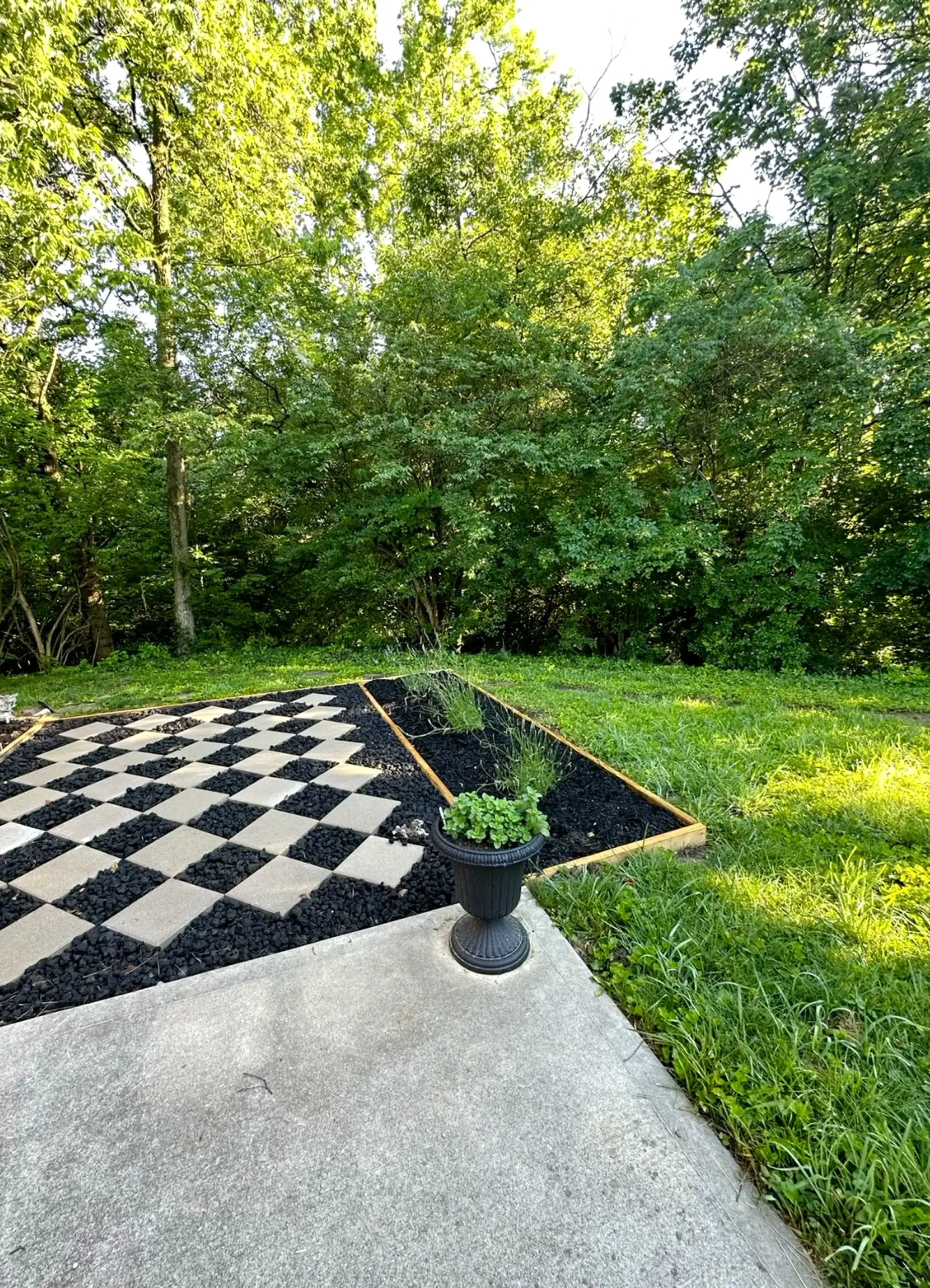 Refined stone path frames the backdrop with personality, making the scene feel soft at the edges.