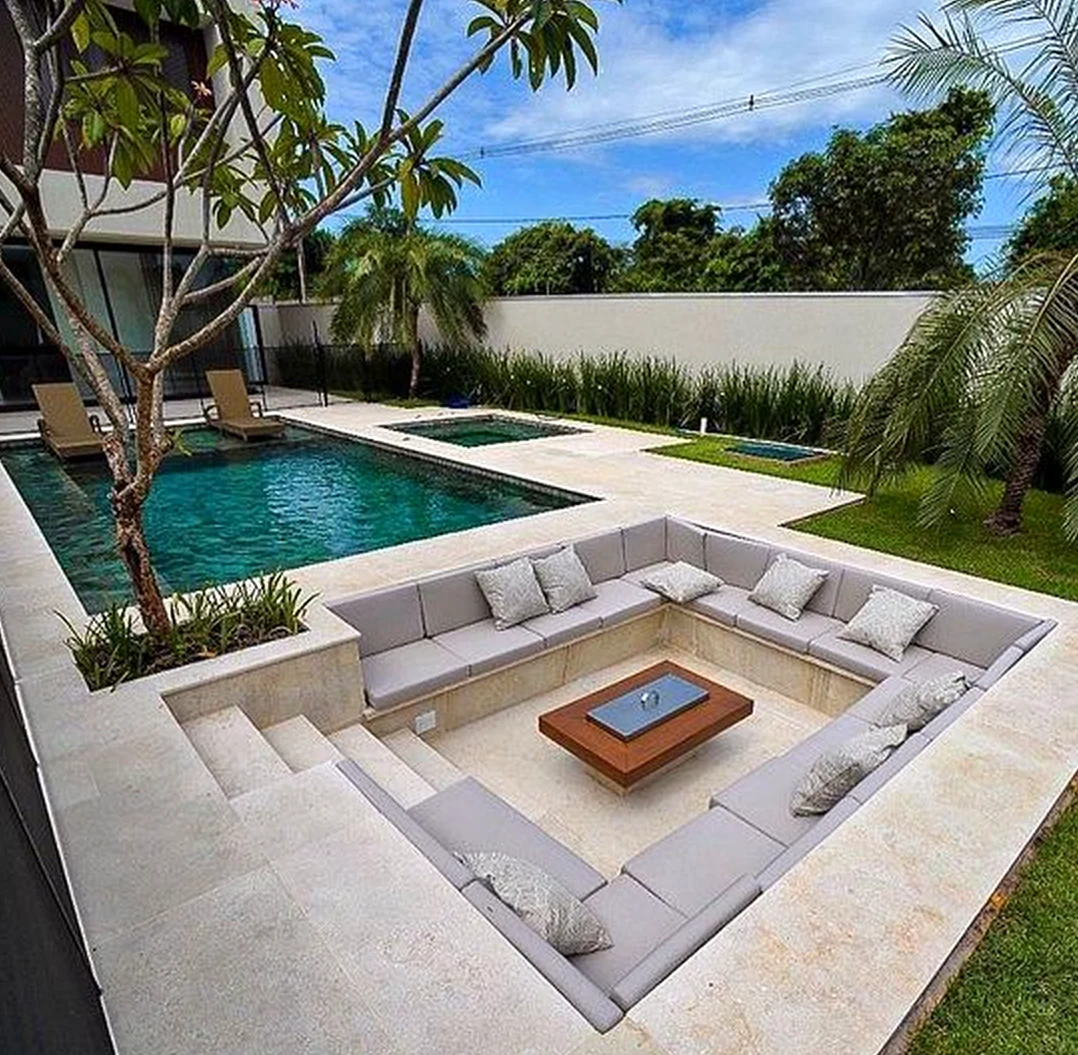 Refined courtyard view frames the arrangement with light, making the scene feel open and lived-in.