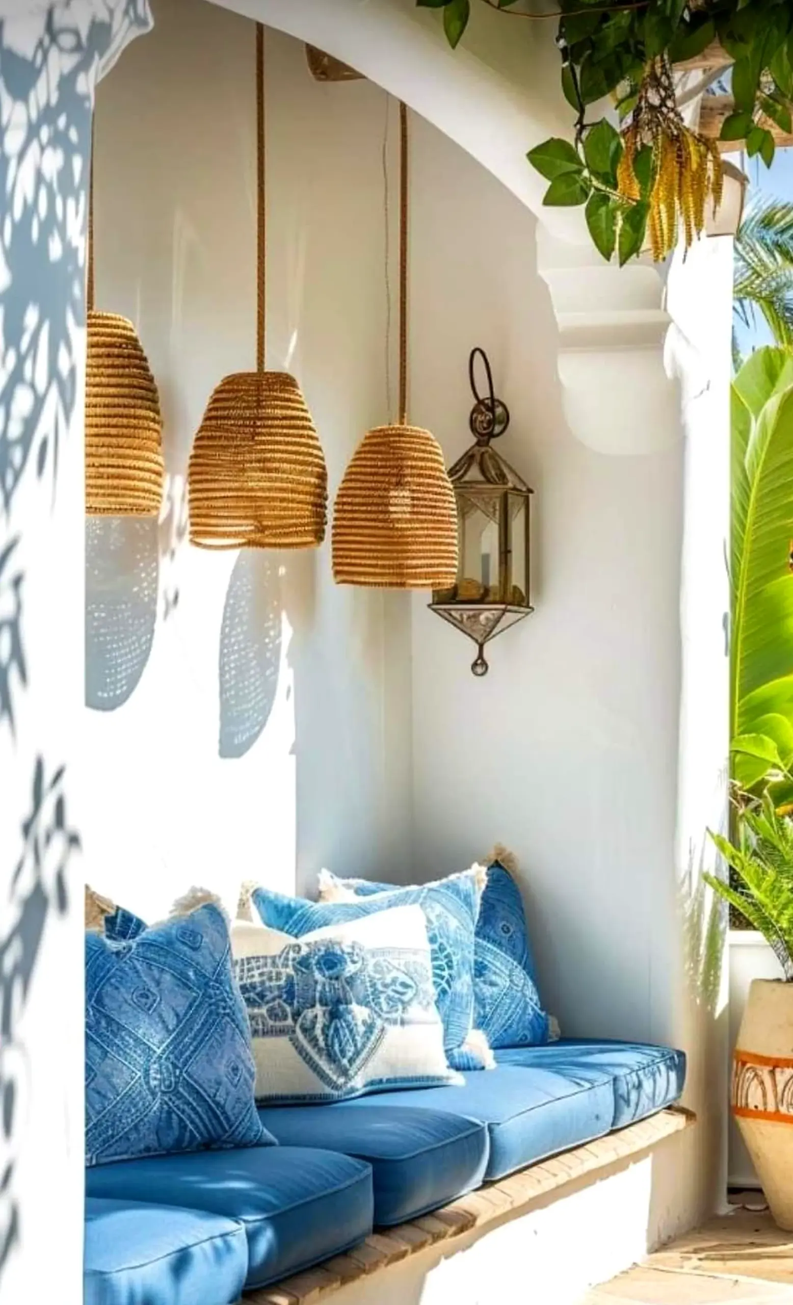 Layered garden seating gives the wall more warmth, so the whole view feels ready for quiet use.